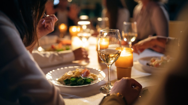 Wine glass at outdoor table 