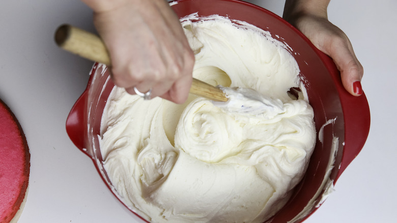 Mixing frosting in bowl