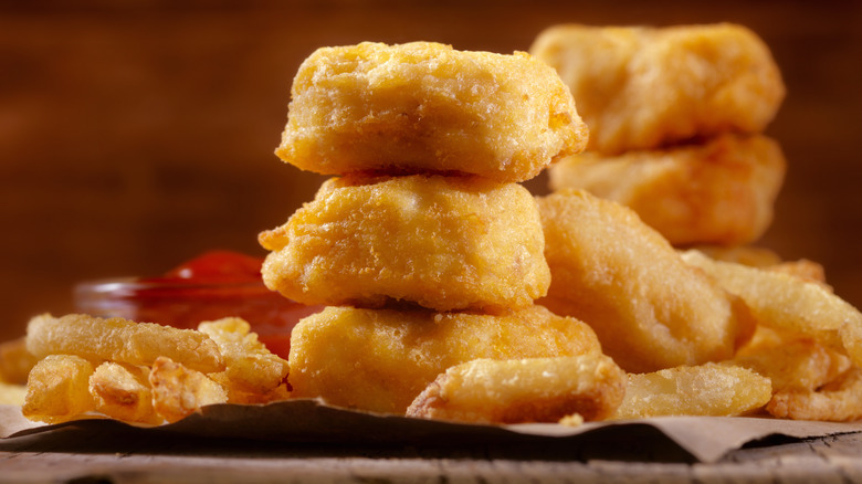 Chicken nuggets with fries and ketchup