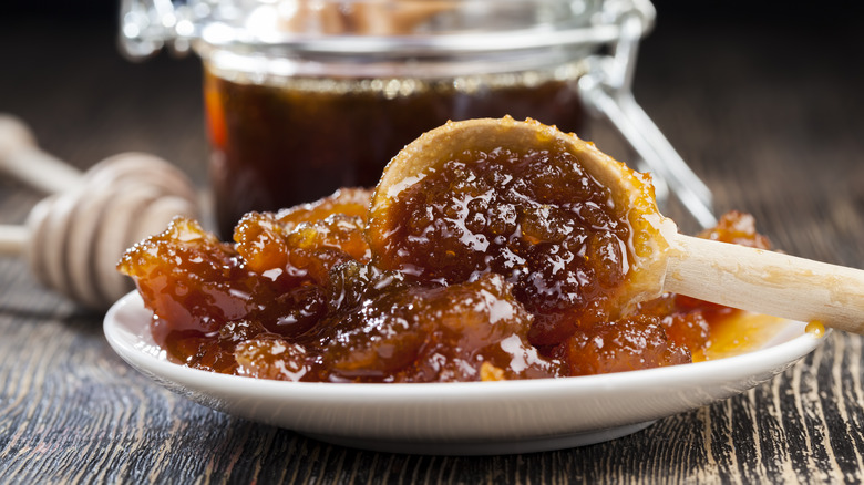 crystallized honey on plate with wood spoon