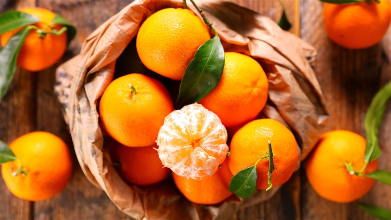 Whole and peeled tangerines