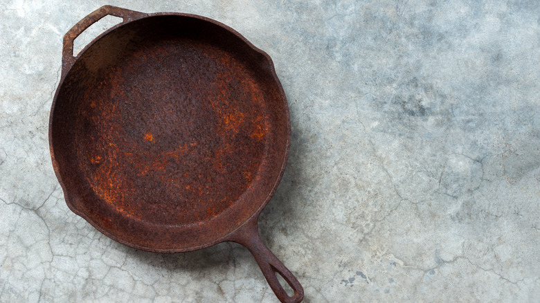 rusty cast iron skillet