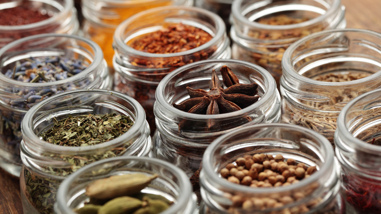 Rows of spices in jars 