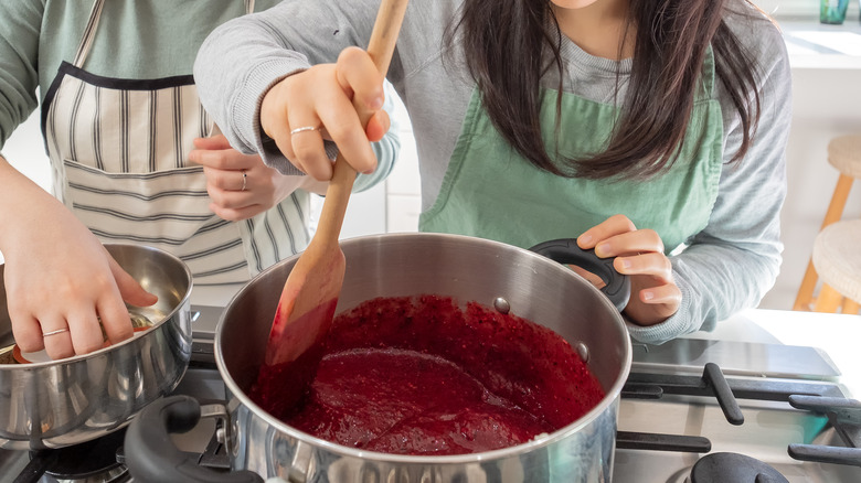 Stirring jam with a spatula 