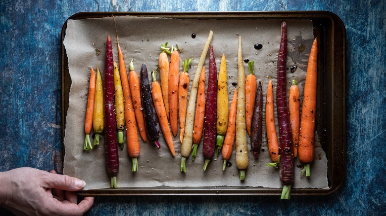 Roasted carrots with blue background