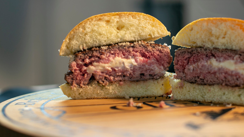 stuffed burger filled with white cheese