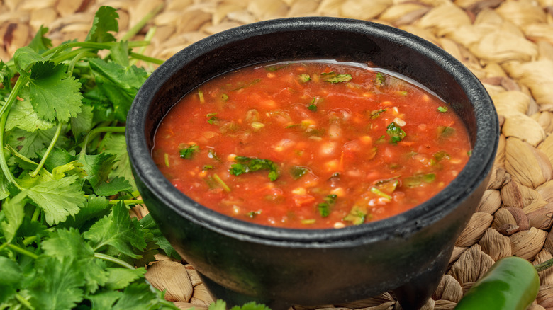 small bowl of watery salsa