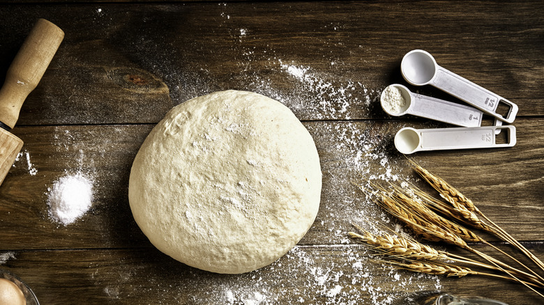 Bread dough on wooden table