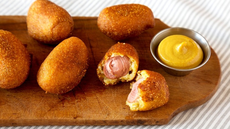 Mini corn dogs with mustard