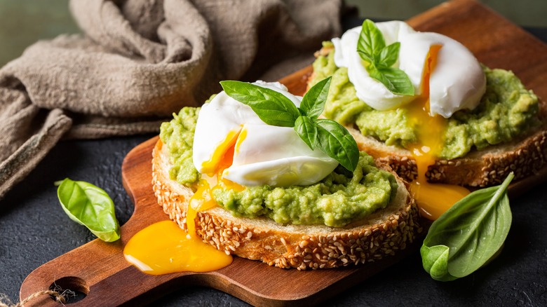 poached eggs on avocado toast