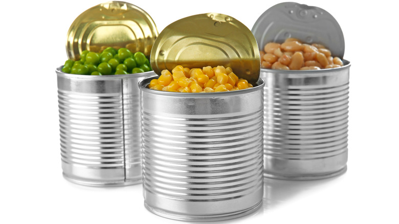 open metal cans of produce