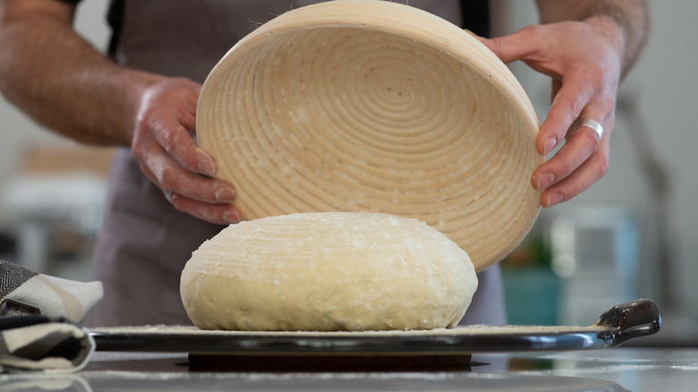 removing dough from bowl