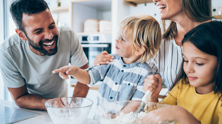 A family baking in the kitchen together