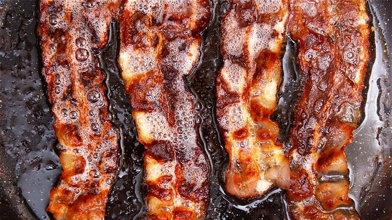 Sizzling bacon and bacon grease