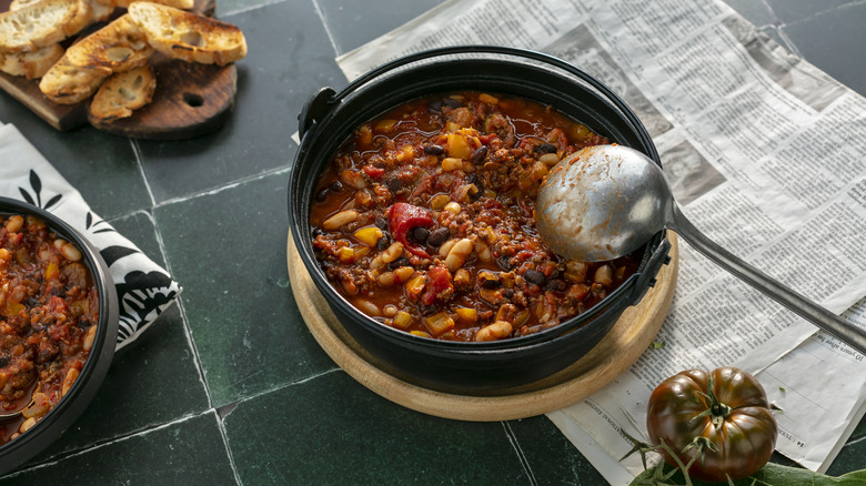 pot of chili with ladle