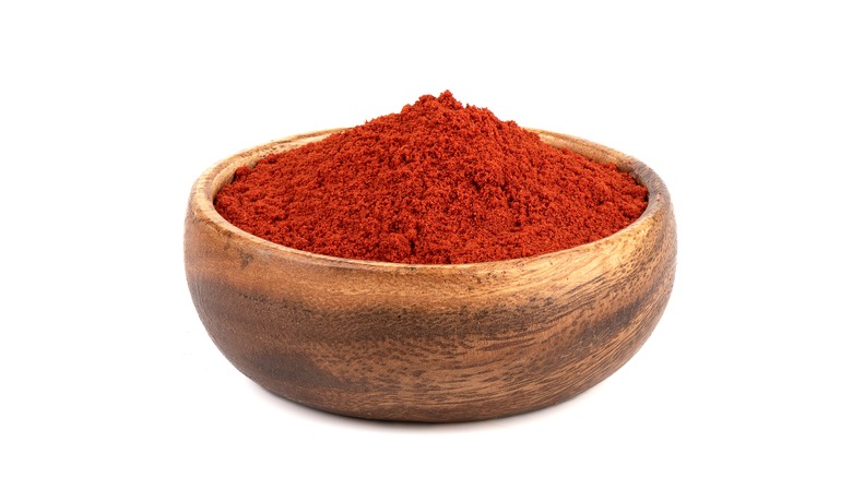 wooden bowl of smoked paprika