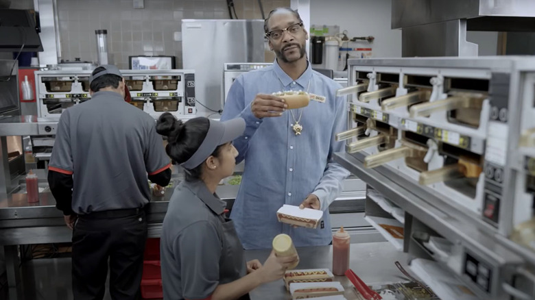 snoop dogg holding hot dog