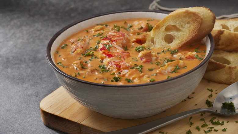 Hearty soup with a piece of bread