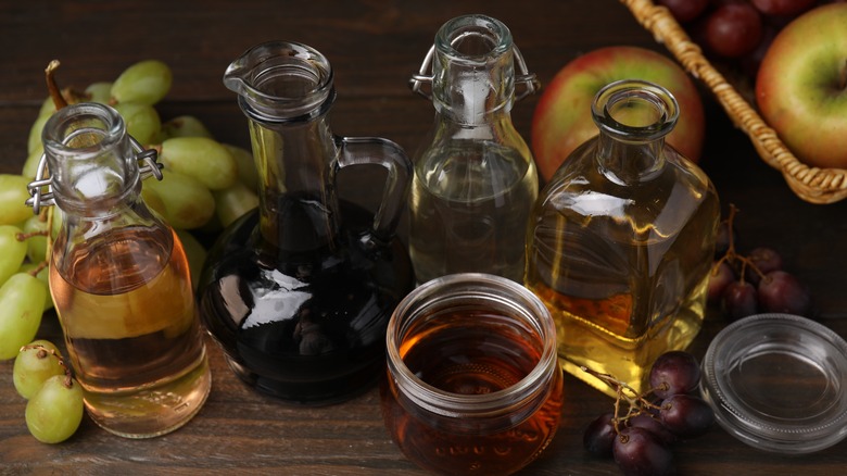 Assortment of various vinegars in glass containers