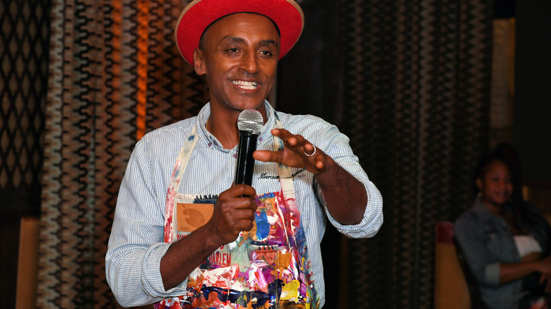 Marcus Samuelsson talks with a microphone