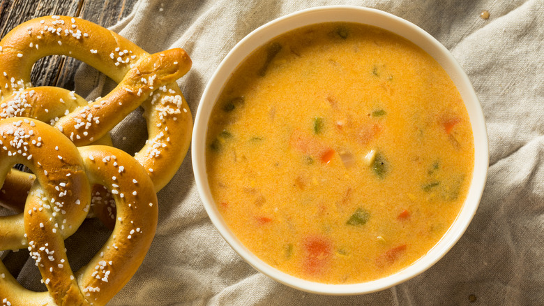 beer cheese dip with peppers and onions