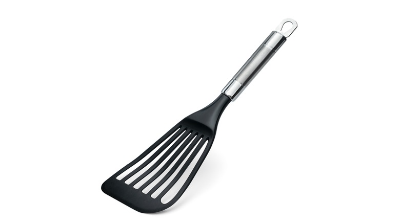 fish spatula on white background