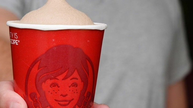 Wendy's Frosty in someone's hand