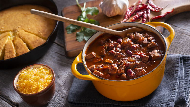 Pot of chili with cornbread