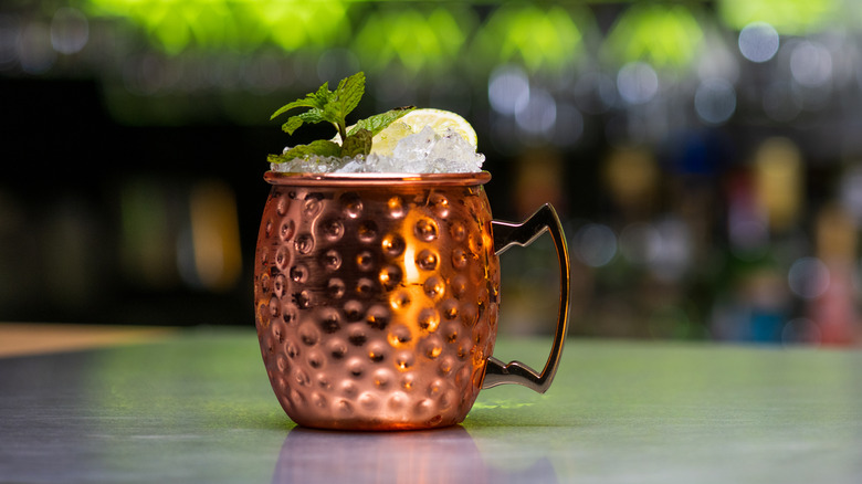 copper mug garnished with mint