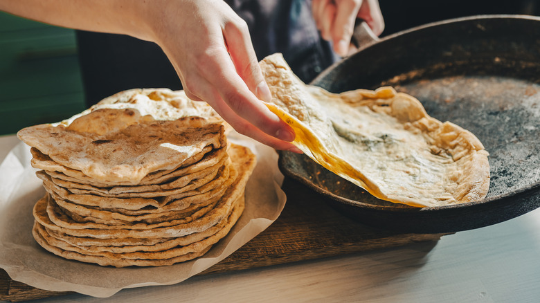 removing tortilla from comal