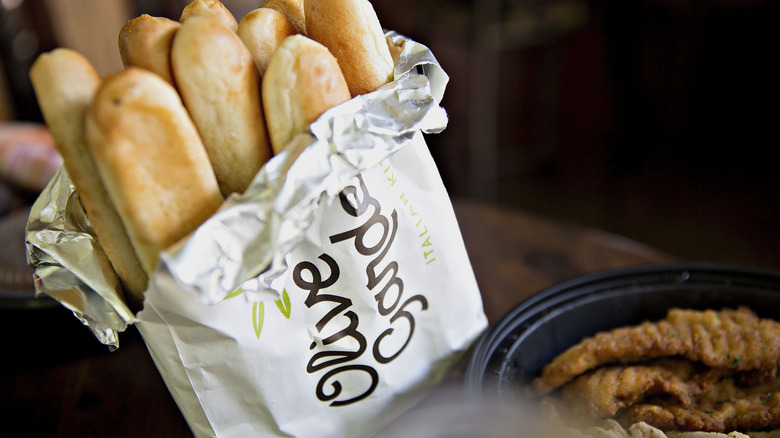 olive garden breadsticks in foil on table