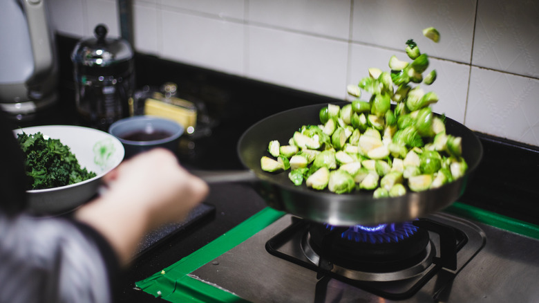 Brussels sprouts in a sauté pan