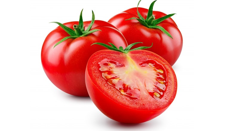 Tomatoes on white background