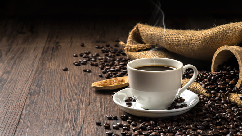 Coffee cup and coffee beans