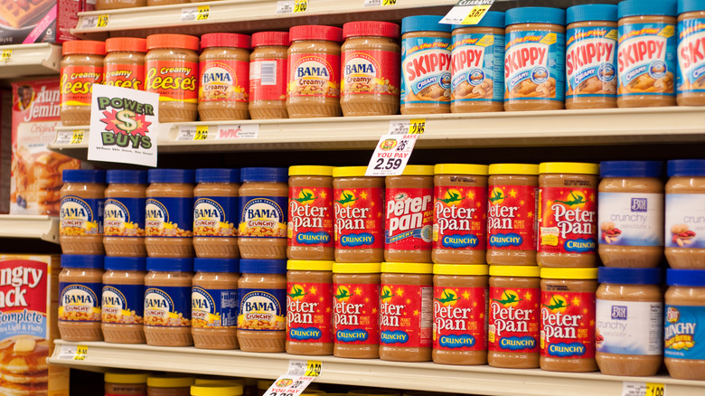 peanut butter jars on store shelf