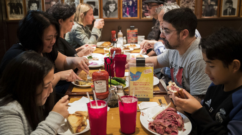 Family eating at an NYC deli