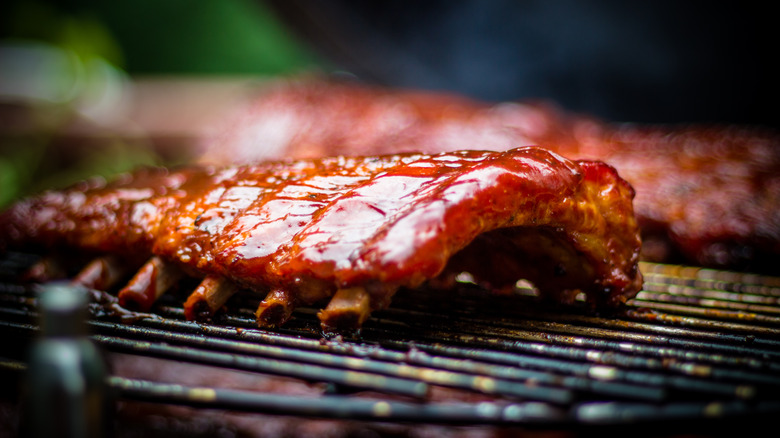 Baby back ribs on a grill