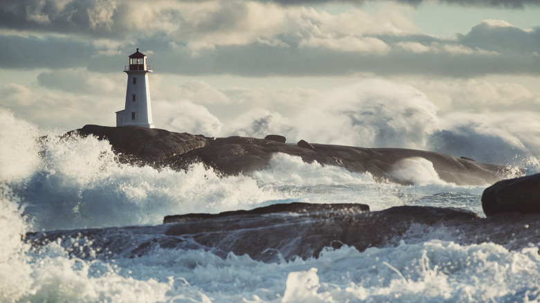 Waves crashing against coastline