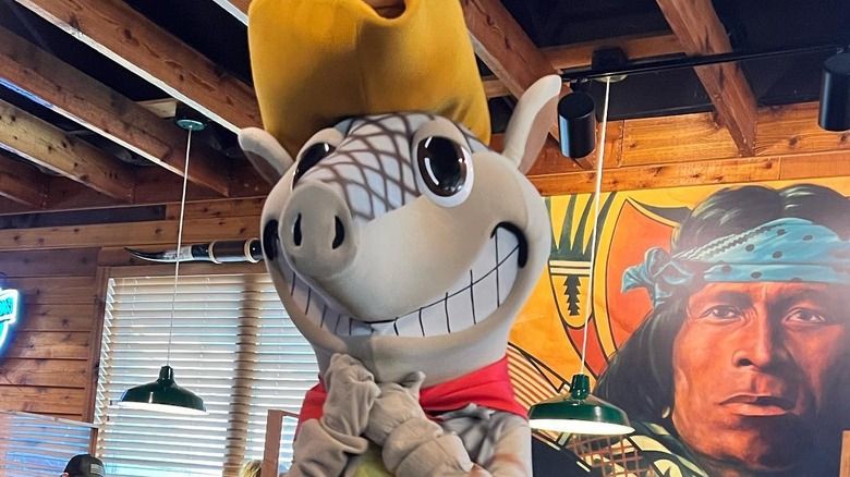 Texas Roadhouse mural and Andy Armadillo