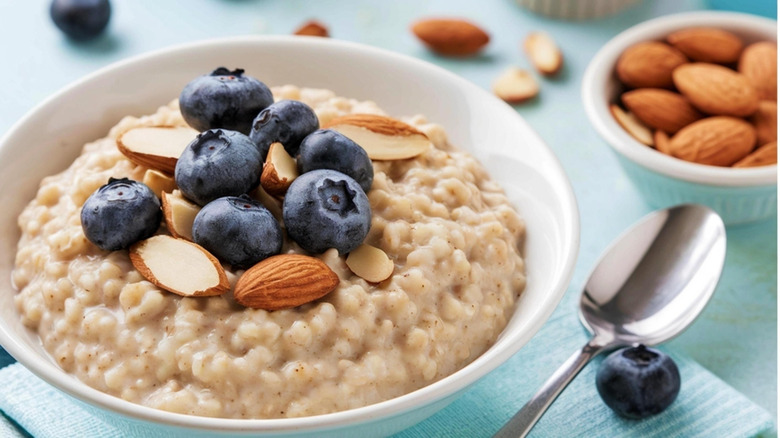 Oatmeal topped with blueberries and almonds