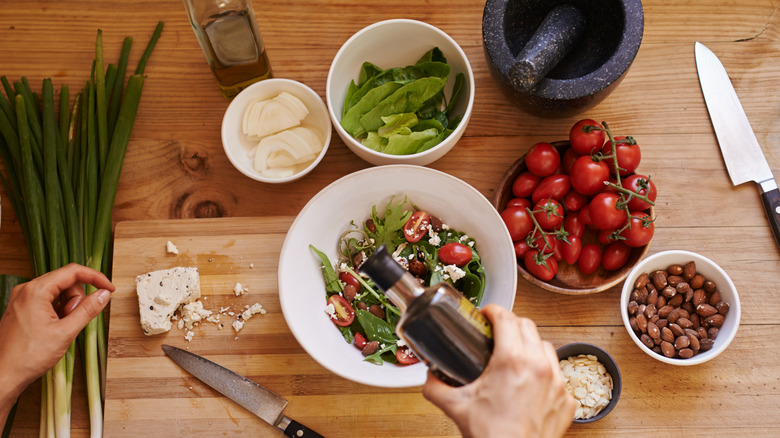 Woman making a salad