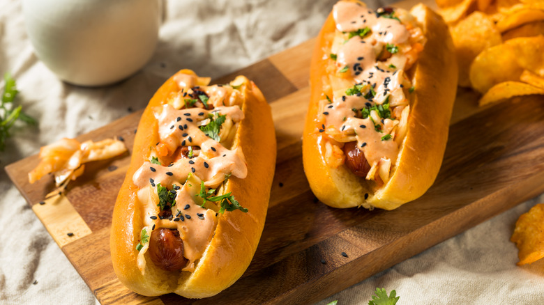 kimchi topped hot dogs