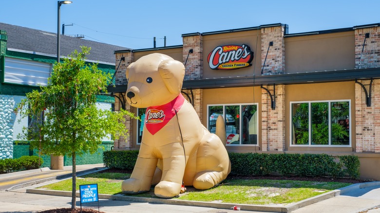 Inflatable Labrador sitting outside restaurant