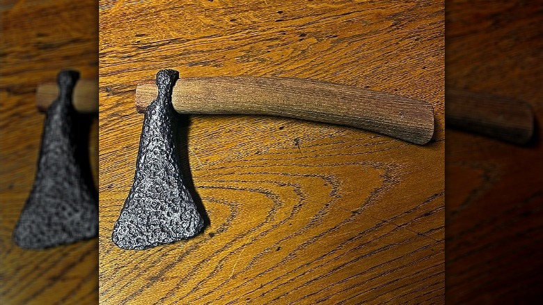 battle axe on wooden table