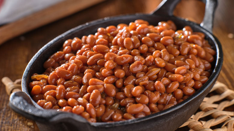 cast iron skillet of baked beans 