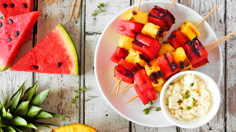 grilled pineapple and watermelon kabobs on skewers