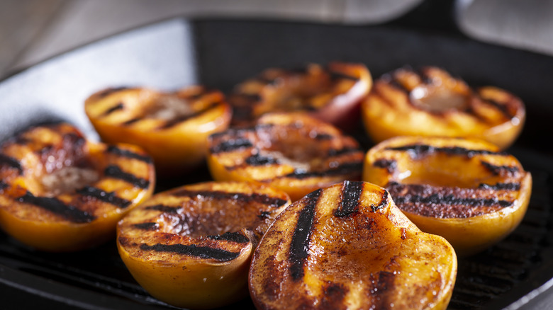 grilled peaches on a grilling pan