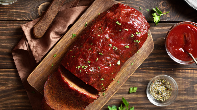 Glazed meatloaf on a cutting board