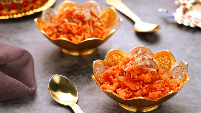 Indian delicacy filling ornate bowls