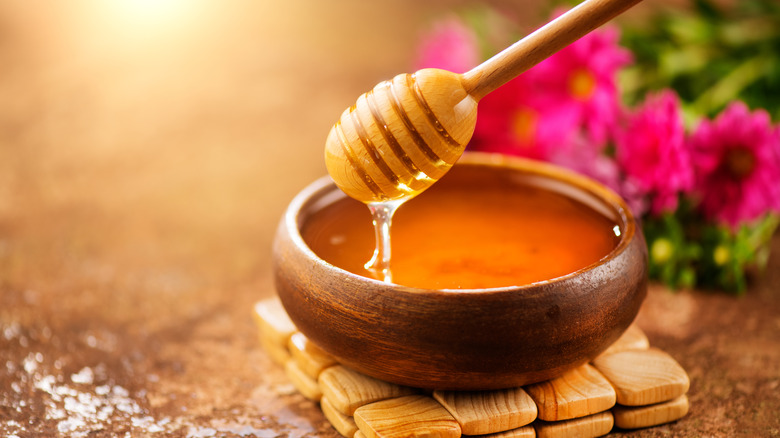 Bowl of honey and honeycomb